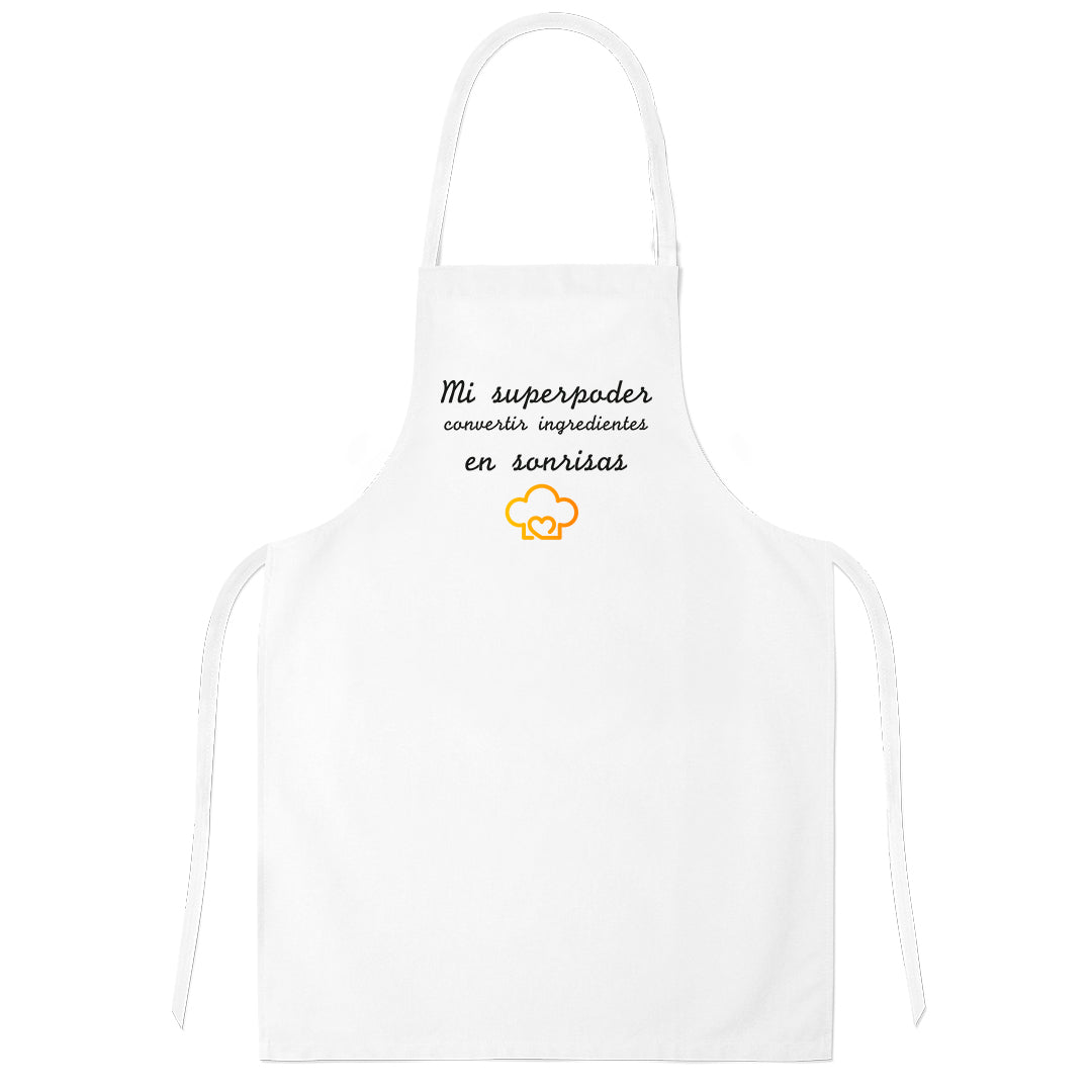 Delantal de cocina "Mi superpoder, convertir ingredientes en sonrisas". Blanco.