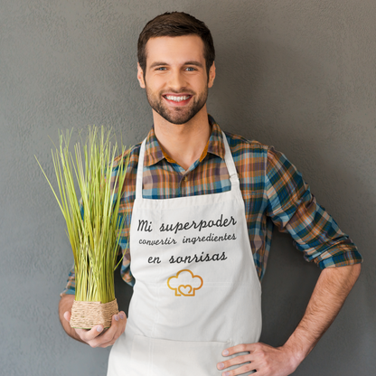 Delantal de cocina "Mi superpoder, convertir ingredientes en sonrisas". Blanco.